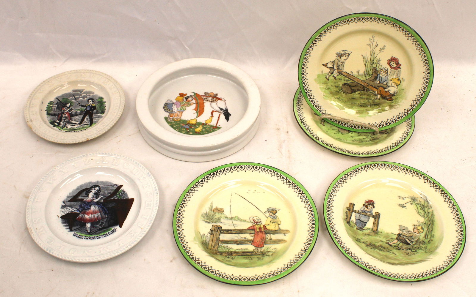 Lot of 7 child related plates incl set of 4 Royal Doulton, 2 Elsmore & Forster ABC plates w transfer (1 of 7)