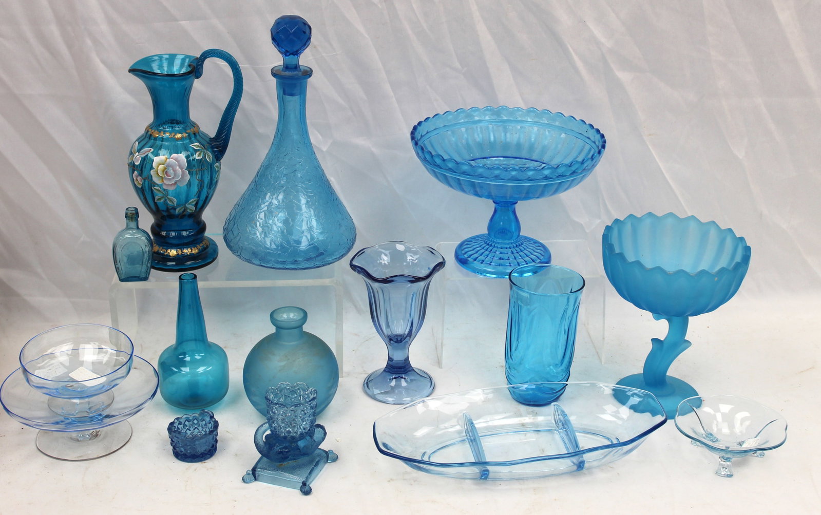 Lot of 15 pieces of blue glass incl compotes, ftd dishes, vase, decanter, bowls, etc: Lot of 15 pieces of blue glass incl compotes, ftd dishes, vase, decanter, bowls, etc