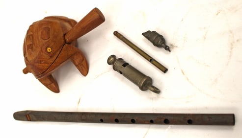 Musical lot incl wooden frog, whistles & flutes