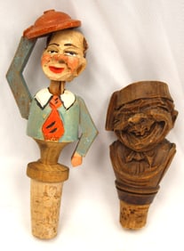 Lot of 2 carved wooden figural corks