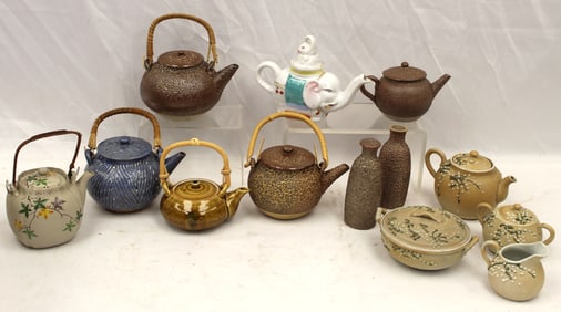Lot of 13 Asian motif teapots/sets