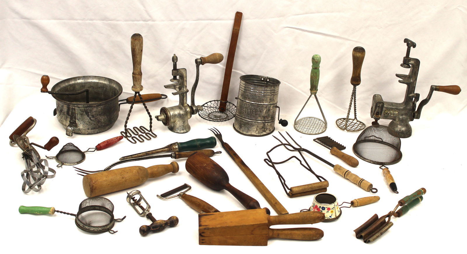 Large lot of wooden handled tin kitchen implements (1 of 9)