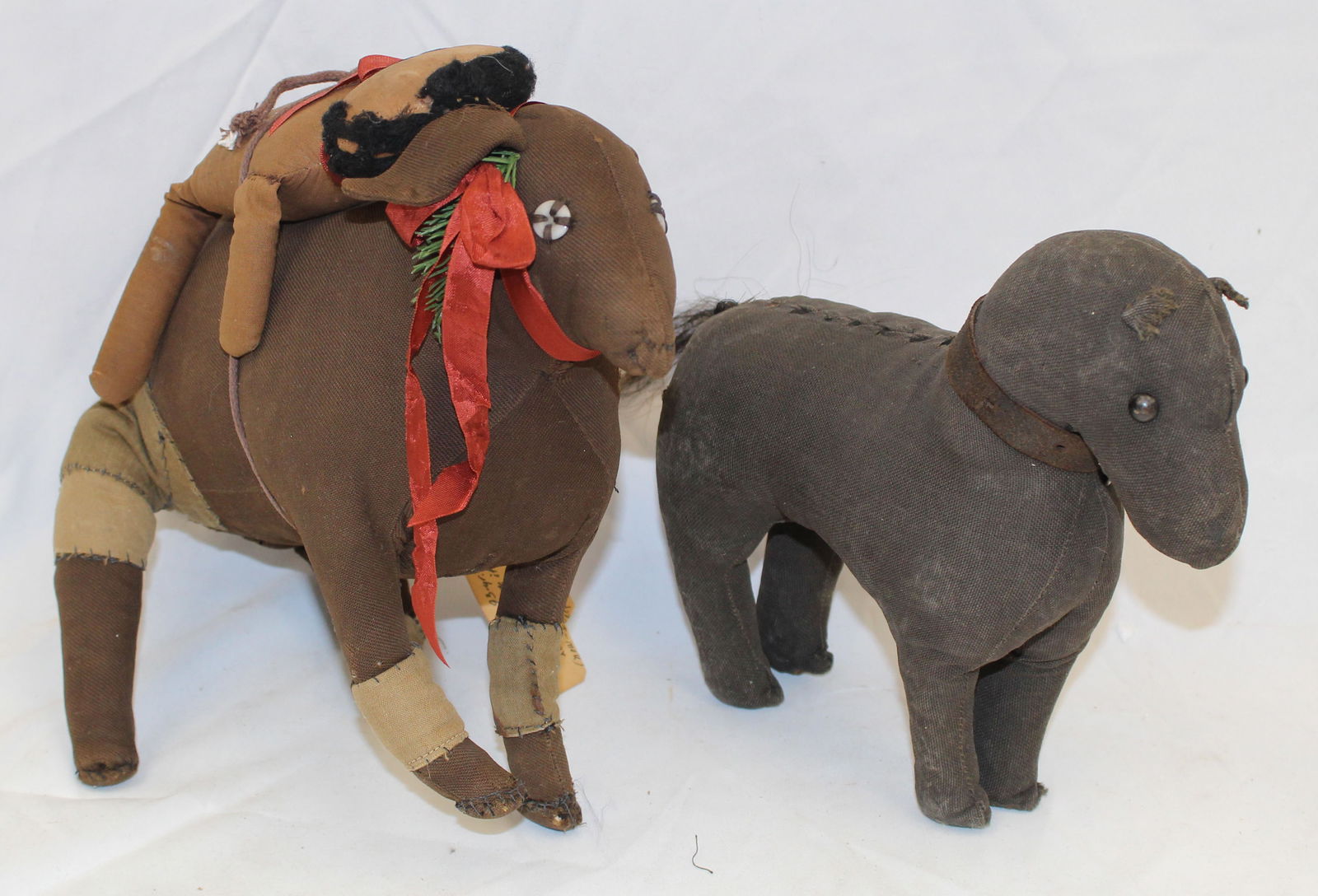 Lot of 2 antique stuffed cloth animals - horse & cow w stuffed man on back - 9" & 11" long x approx (1 of 5)
