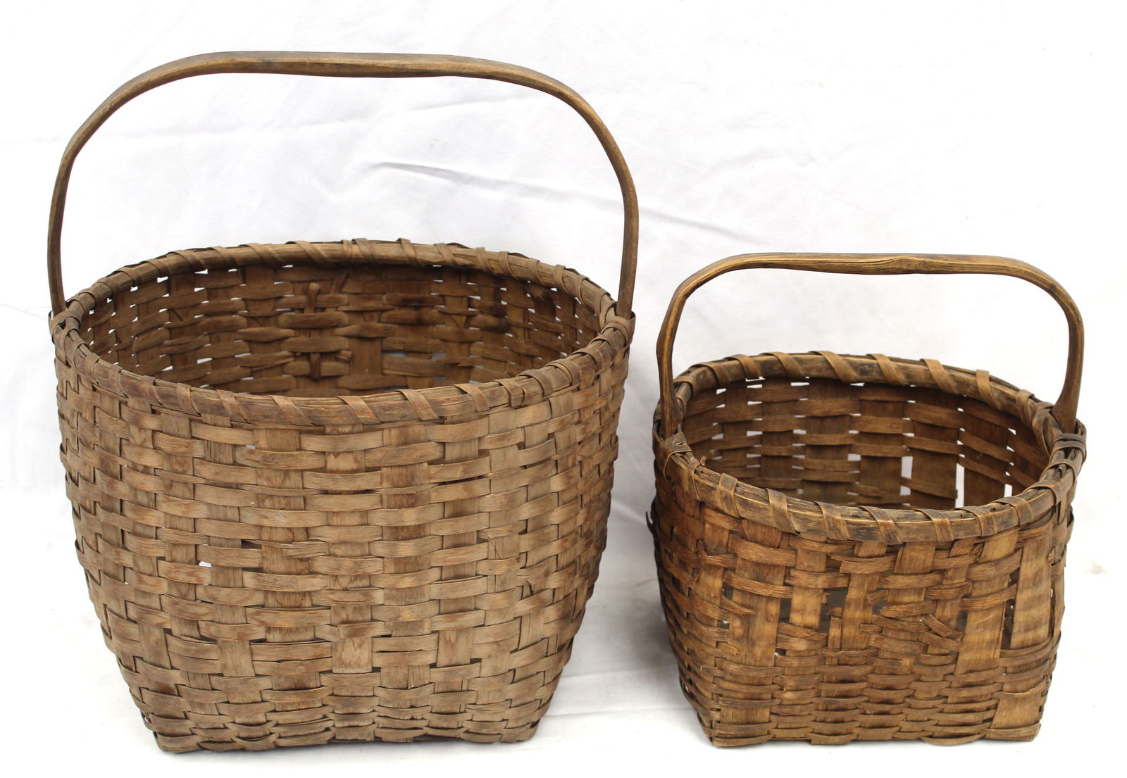 Lot of 2 round fixed handled baskets - 11" diam x 14" & 9 1/2" diam x 10" (1 of 7)