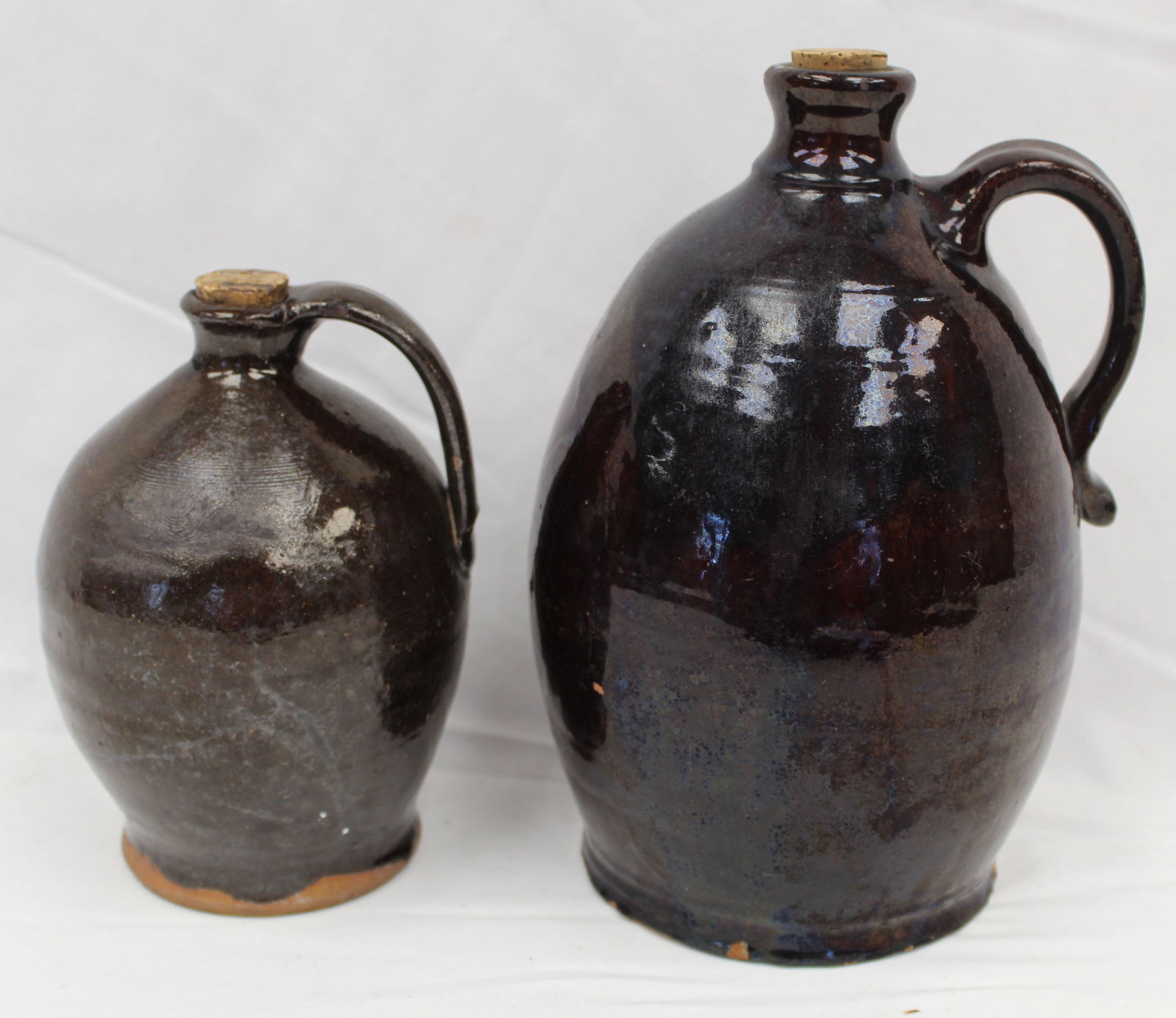 Lot of 2 antique redware jugs - 6 1/2" & 9" (1 of 7)