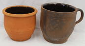 Lot of 2 antique redware lard pots - 1 w handle - 6" & 7" tall