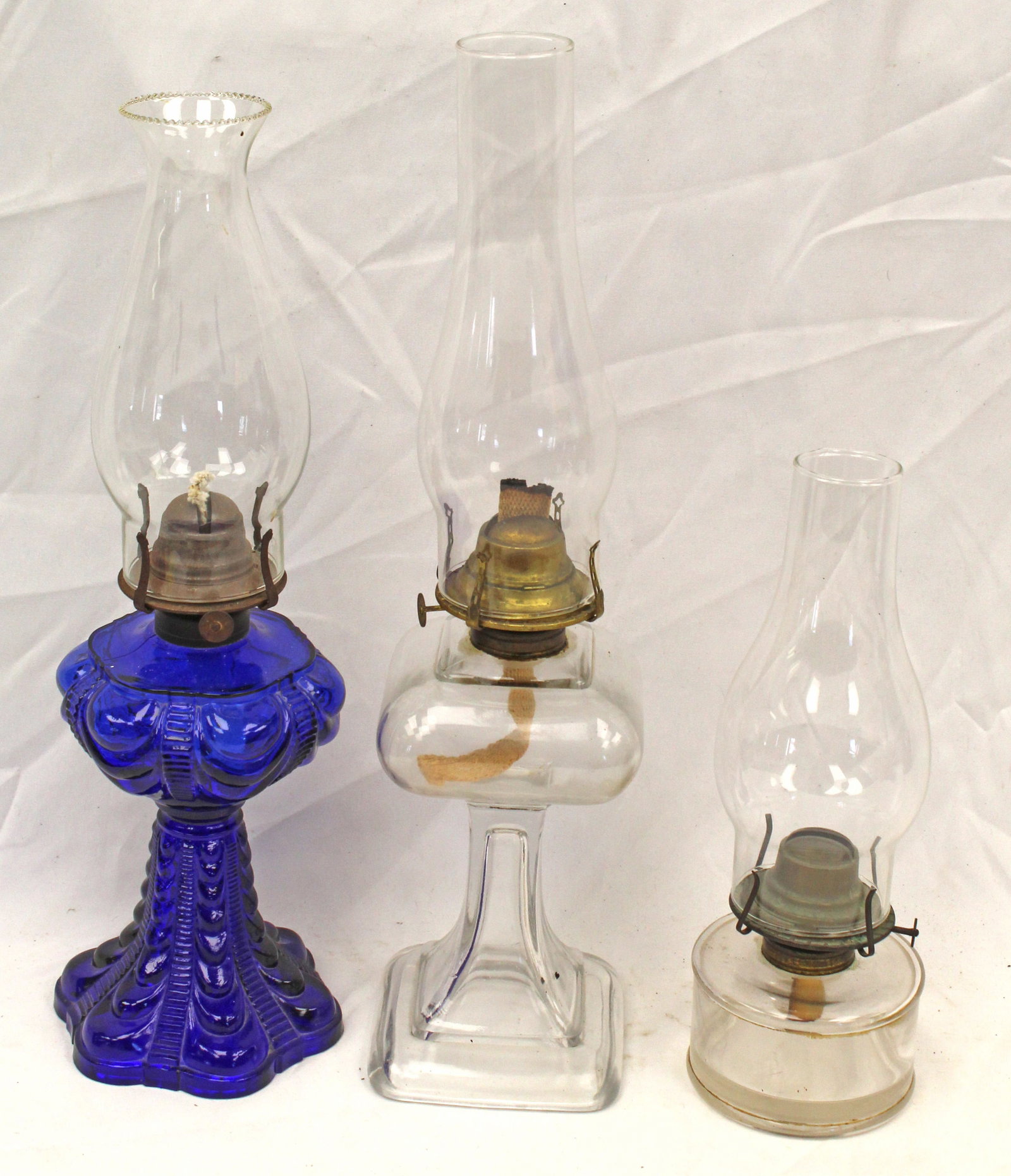 Lot of 3 antique oil lamps incl 1 in cobalt - 12 1/2" - 19 1/2" tall: Lot of 3 antique oil lamps incl 1 in cobalt - 12 1/2" - 19 1/2" tall