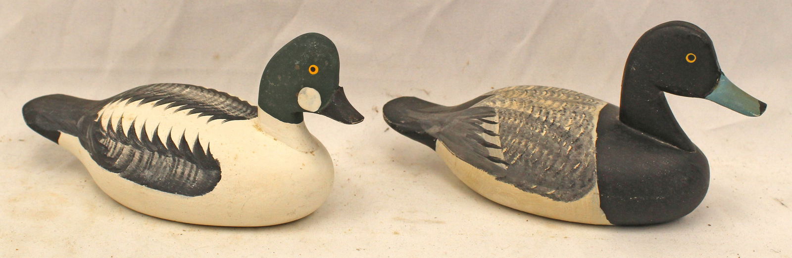 Pair of carved wooden painted ducks signed on bottom Capt. Urie Rock Hall, MD - 3 1/2"x6" & 3 1/2"x5: Pair of carved wooden painted ducks signed on bottom Capt. Urie Rock Hall, MD - 3 1/2"x6" & 3 1/2"x5 1/2"