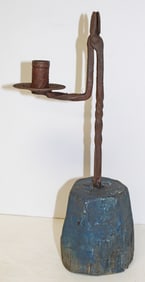 iron rush light on blue painted wooden base - 13" tall
