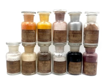 Lot of 11 19thC Lowe Bros paint pigments in blown glass bottles -