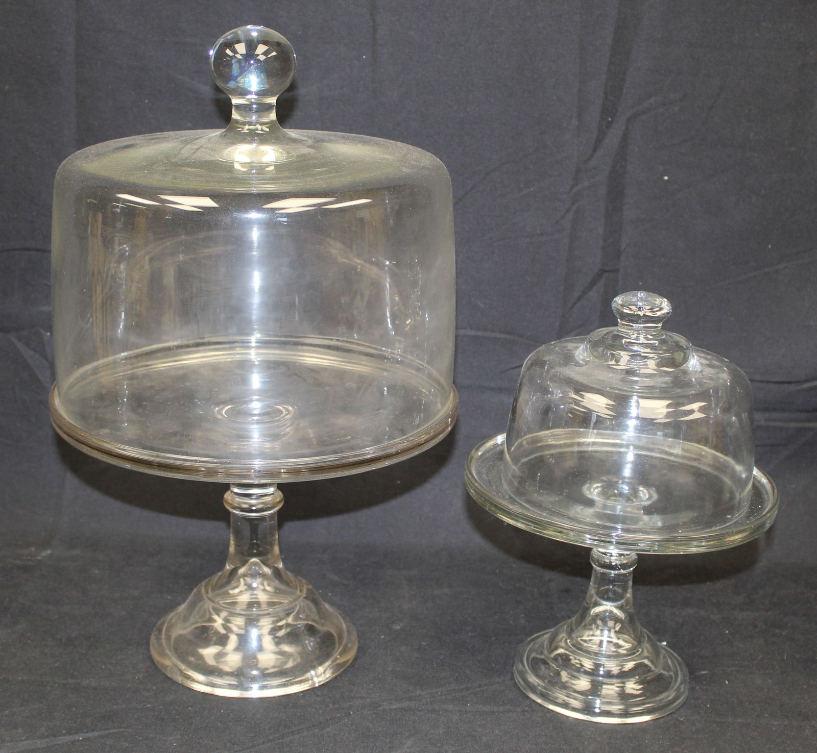 Lot of 2 glass cake stands w covers - 17" tall x 10" diam & 11" tall x 8" diam (1 of 3)