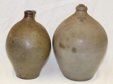 Lot of 2 ovoid stoneware jugs incl a 2 gal T.Crafts Whately & a 1 gal Boston (as found - broken