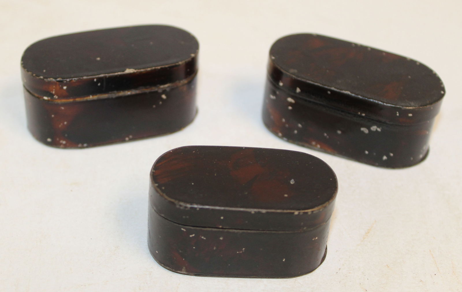 Lot of 3 antique tin travel nutmeg graters in tortoise paint dec w inlay - each approx 2" - 2 1/2" (1 of 5)