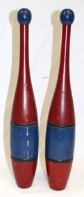 Pair of blue & red painted wooden Indian clubs - 18" tall