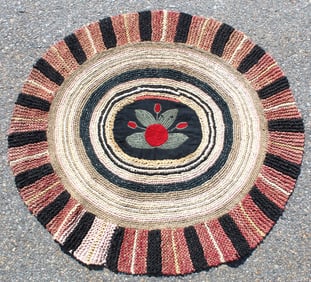 Antique oval rag/braided rug w floral center - 36"x40"