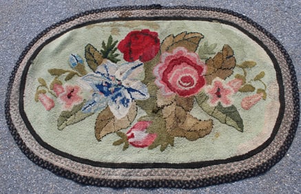 Antique oval hooked rug w floral motif center & braided edges - 38 1/2"x59"