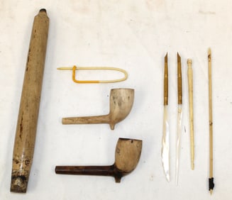 Lot of clay pipes, wooden candle & bone items - 3" - 9" long