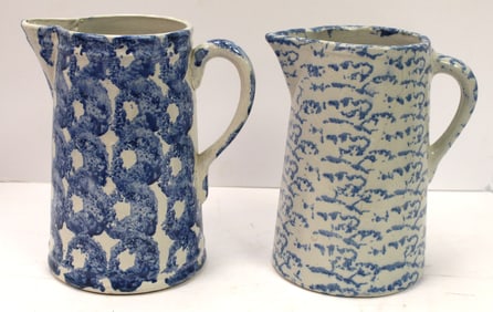 Lot of 2 antique spongeware pitchers - 9" & 9 1/2" tall