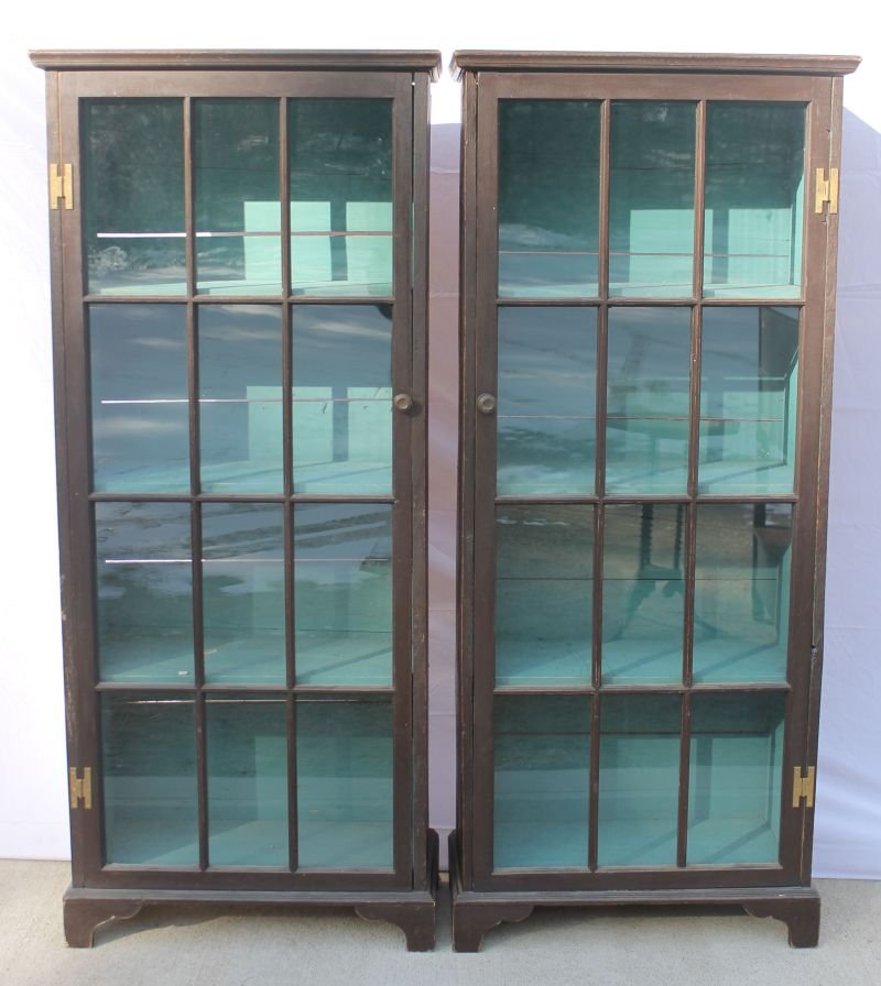 pr of antique late 19thC pine 1 door bookcases w mullio: pr of antique late 19thC pine 1 door bookcases w mullioned glass panels in old Spanish Brown paint w interior blue wash - 5'2" tall x 27" wide x 13" deep
