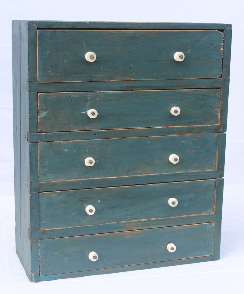 small table top 5 drawer chest (possibly apothecary) in: small table top 5 drawer chest (possibly apothecary) in old blue paint w white porcelain knobs - 21" tall x 17 1/2" wide x 7" deep