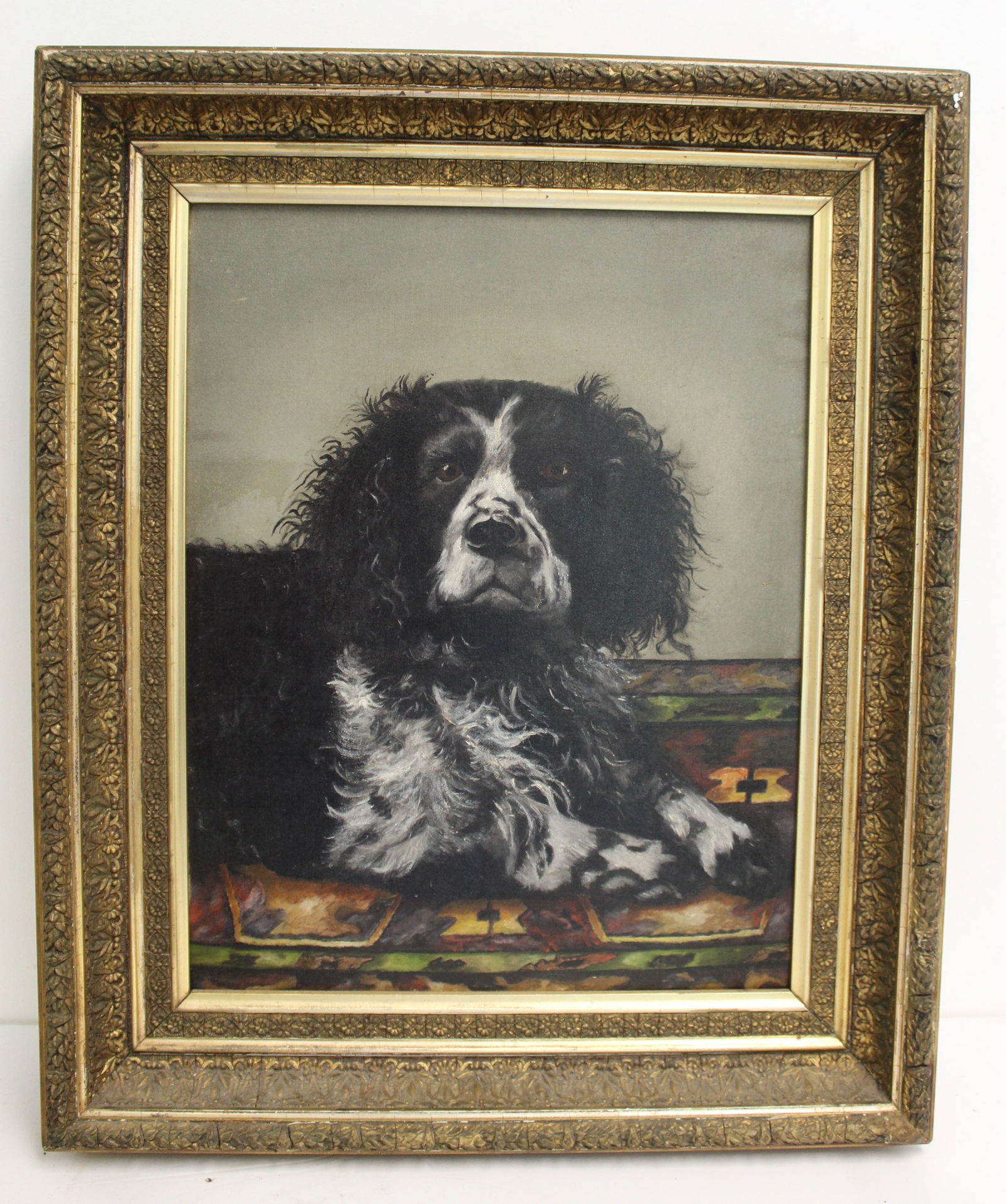 Unsigned oil on canvas portrait of a dog laying on an Oriental Rug - overall framed size 24"x19 1/2" (1 of 5)