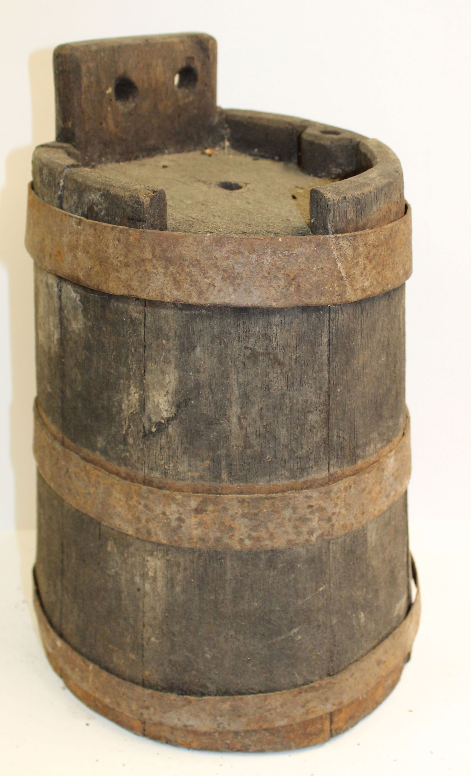 Antique dark oak wagon cask w 1 flat side - 13" tall x 7 1/2" diam: Antique dark oak wagon cask w 1 flat side - 13" tall x 7 1/2" diam