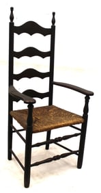 Antique Provencial ladderback armchair w rush seat in later black paint - 48" tall x 24" wide w 17"