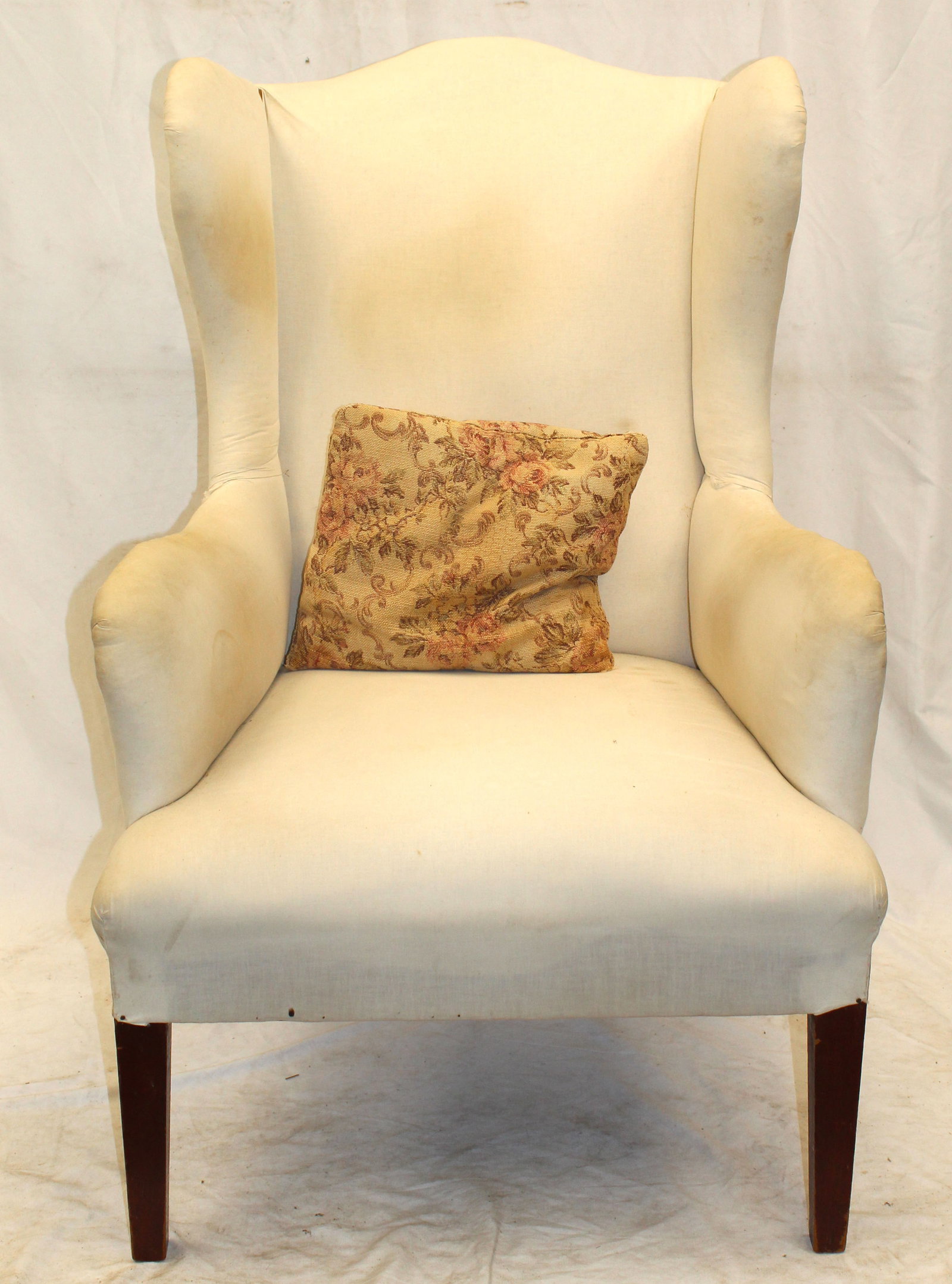 Antique wing chair w white upholstery - 45" tall x 31" wide x 23" deep w 19" seat height: Antique wing chair w white upholstery - 45" tall x 31" wide x 23" deep w 19" seat height