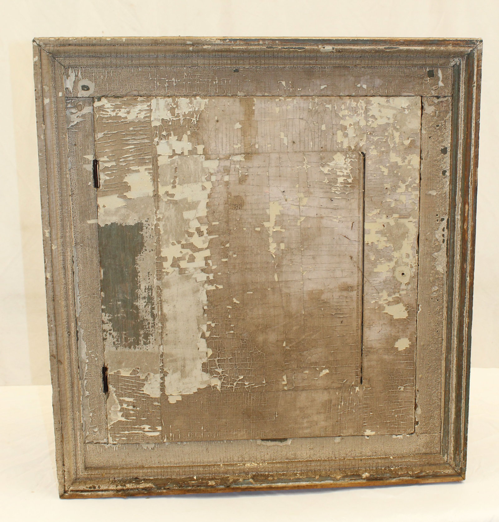 Antique built in wall cupboard w 1 door in gray paint - as found - no hinges on door - 25" tall x: Antique built in wall cupboard w 1 door in gray paint - as found - no hinges on door - 25" tall x 23" wide x 18" deep