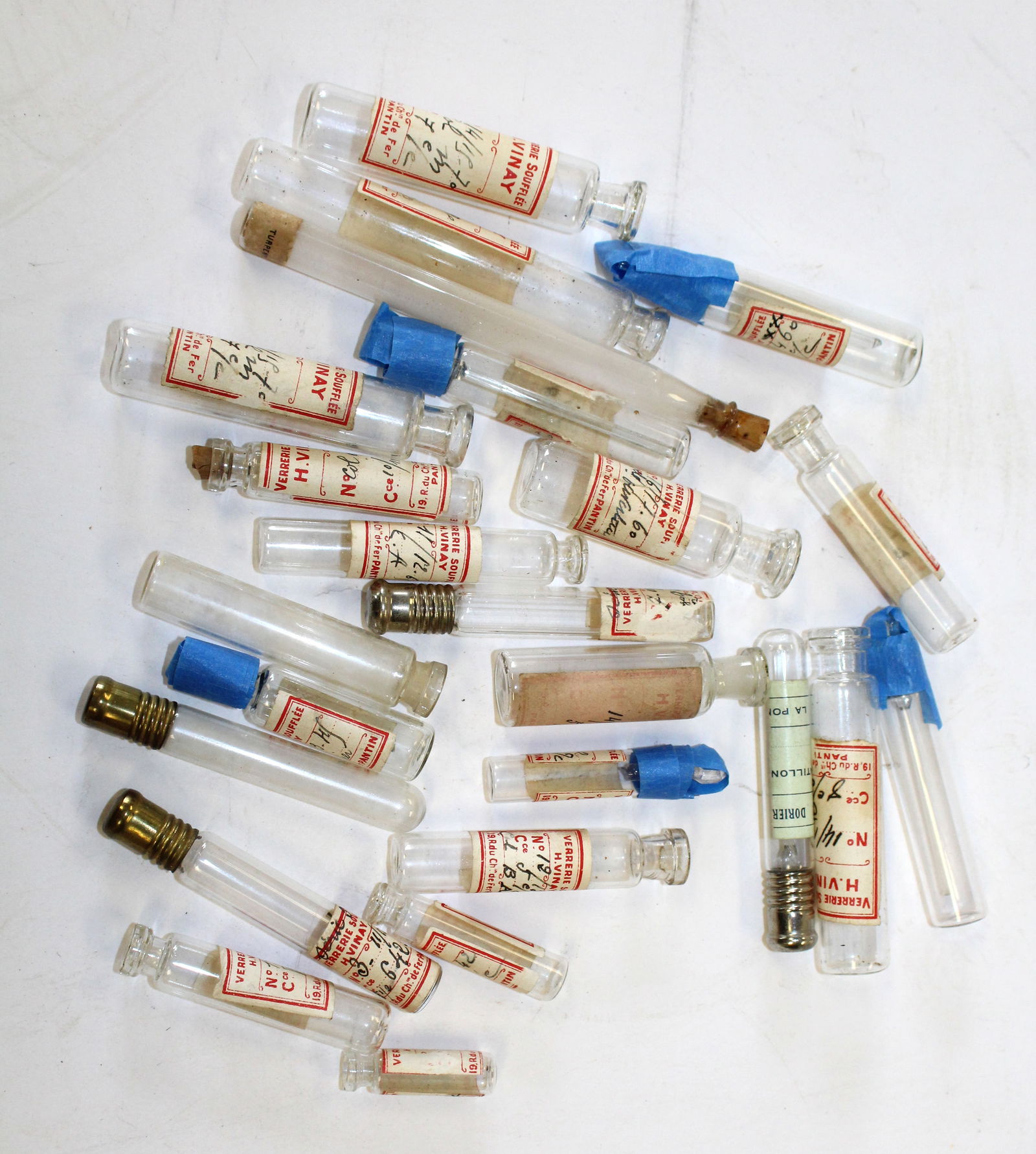 Lot of approx 24 French labeled perfume bottles/vials, labeled 'turpentine' sample bottle "Verrerie (1 of 5)
