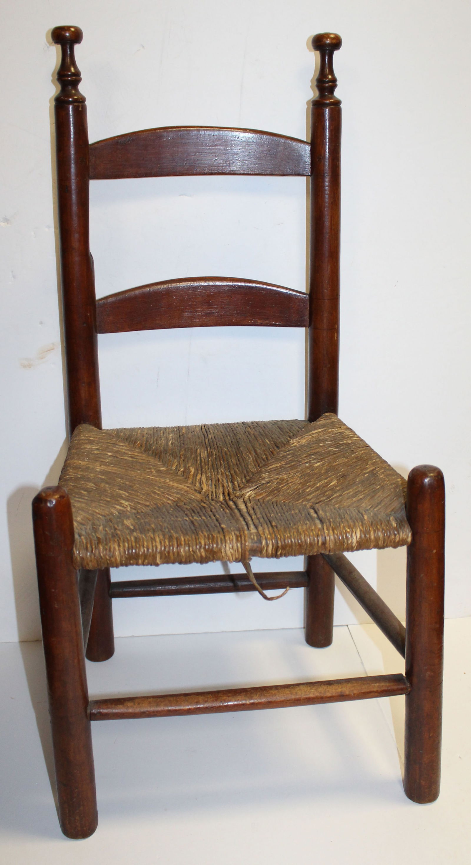 Antique ladderback youth chair w rush seat: Antique ladderback youth chair w rush seat