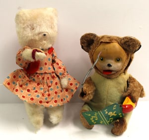 Lot of 2 tin wind ups incl bear w music & baton and white cat in dress - as found - 6" & 5" tall