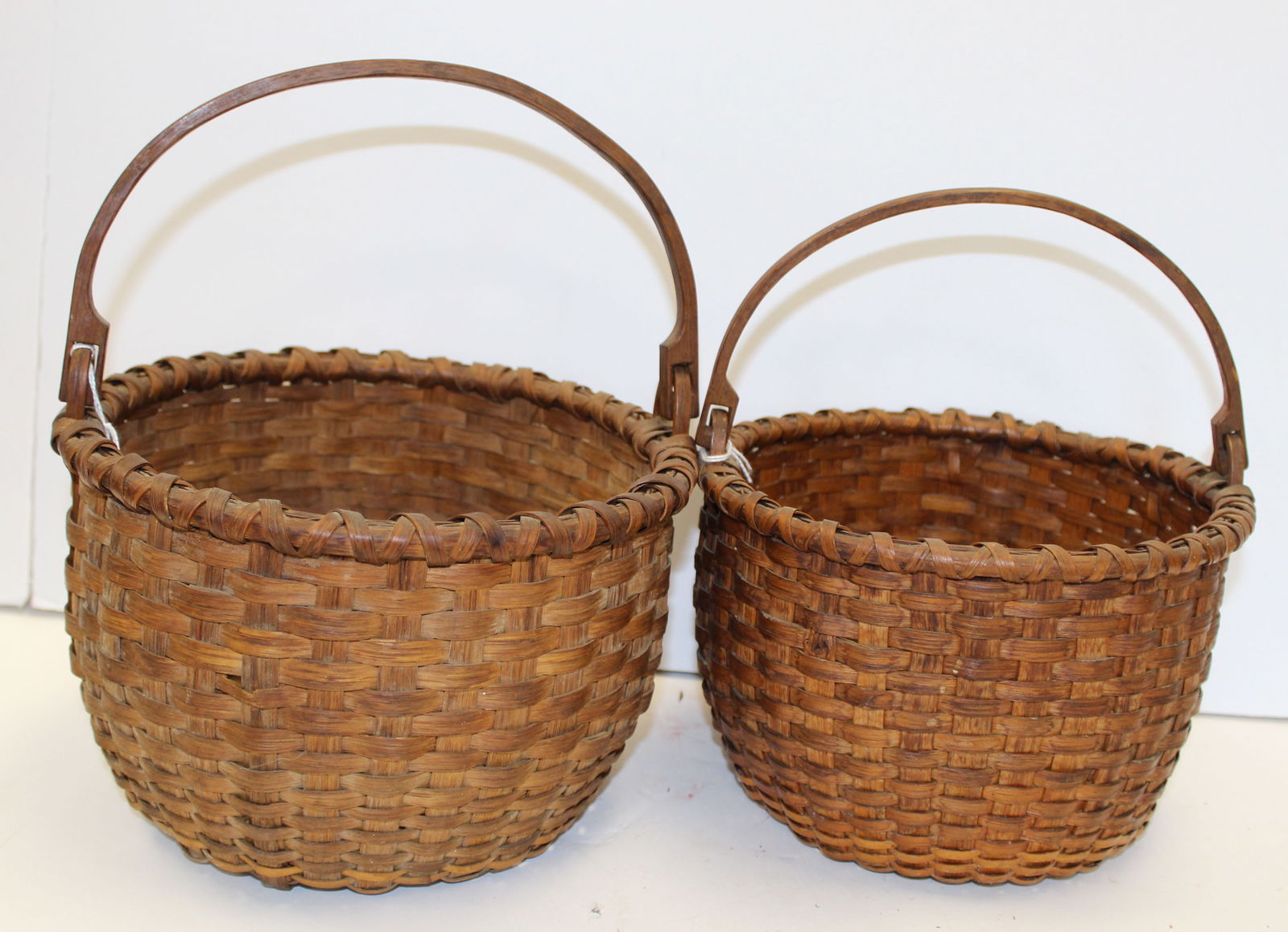 Lot of 2 Matteson swing handled baskets - 5 1/2"x9" diam & 5 1/4"x8" diam (1 of 7)