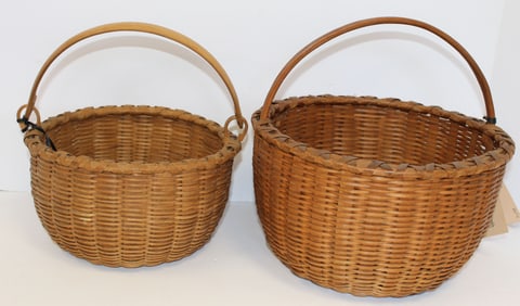 Lot of 2 Taghkanik baskets - 1 swing handled & 1 fixed handled - 5"x9" diam & 10" x 10 1/2" diam