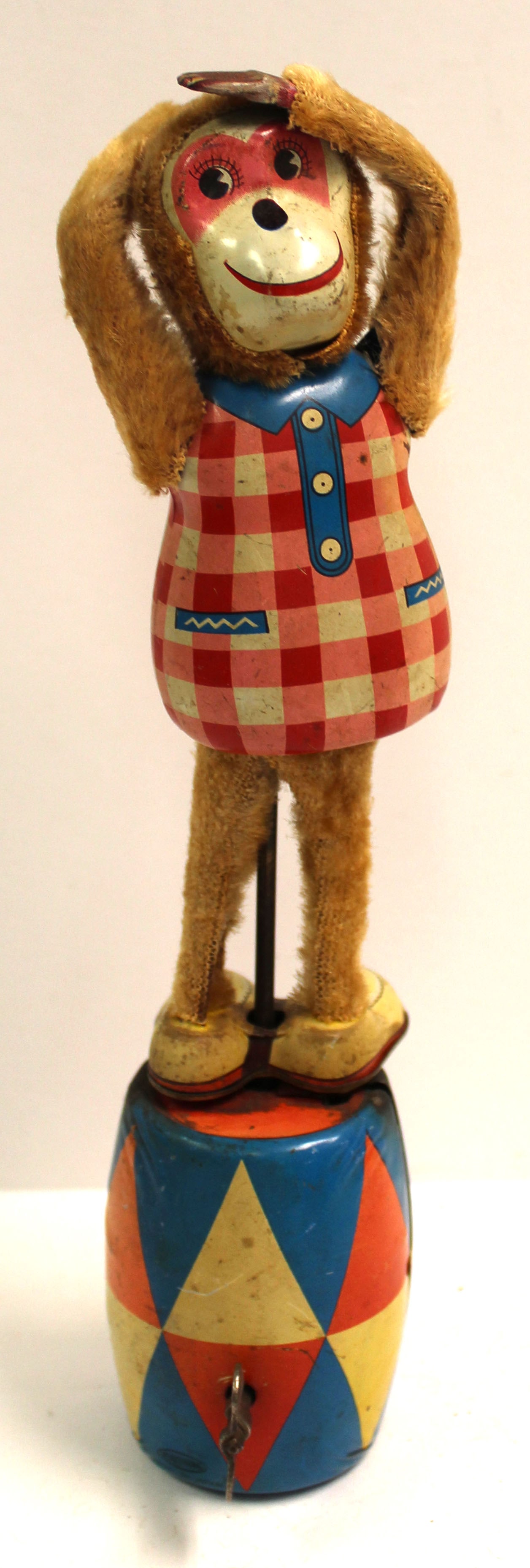 Tin wind up monkey on a barrel - 9 1/2" tall: Tin wind up monkey on a barrel - 9 1/2" tall