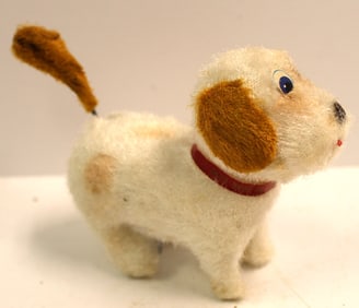 White furry wind up dog w spinning tail - 4 1/2"