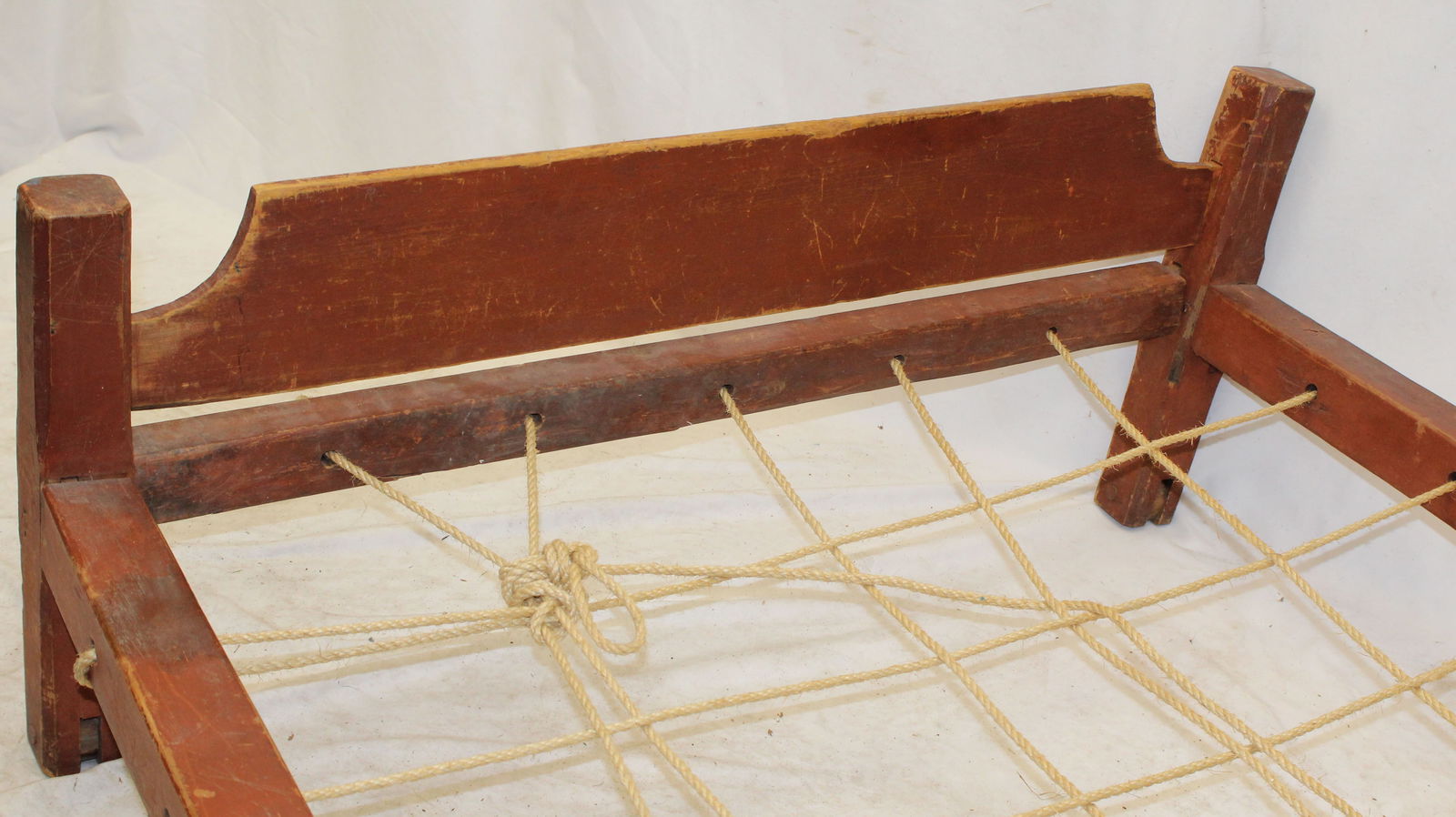 Antique trundle rope bed in red paint - 19" tall x 45 1/2" wide x 60" long (1 of 4)