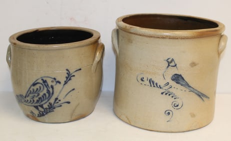 Lot of 2 antique stoneware crocks w cobalt bird dec - a 1 gal ovoid & a 2 gal - both as found