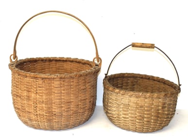 Lot of 2 round swing handled baskets - 1 w bail handle possibly Taghkanik