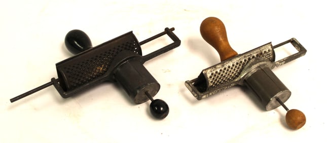 Lot of 2 antique nutmeg graters - 7 1/4" & 5"