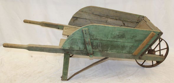 Antique wheelbarrow in green paint - 24" tall x 65" long x 23" wide