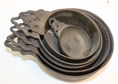 Nest of 6 cast iron posnets - some marked "Bellevue" & T&C Clarke - 4 1/2"- 9 1/2"