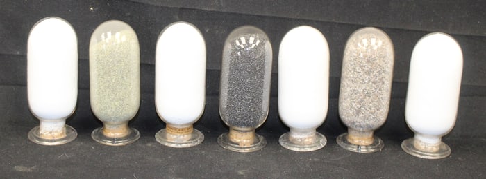 Lot of 7 inverted show globes w contents - 5" tall