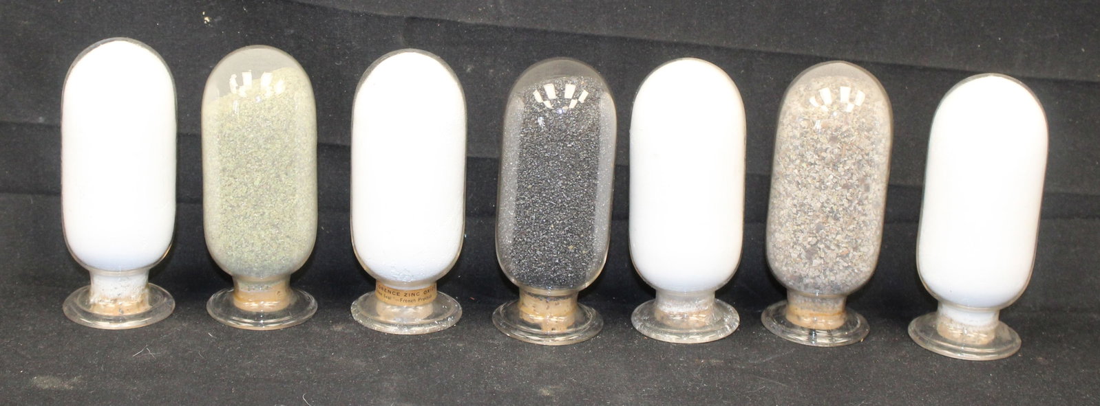 Lot of 7 inverted show globes w contents - 5" tall: Lot of 7 inverted show globes w contents - 5" tall