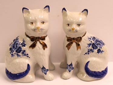 Pair of blue & white Staffordshire cats w copper lustre bows - 8" tallx5 1/2"