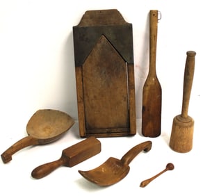 Lot of wooden implements incl spoons, paddles, slicer, etc