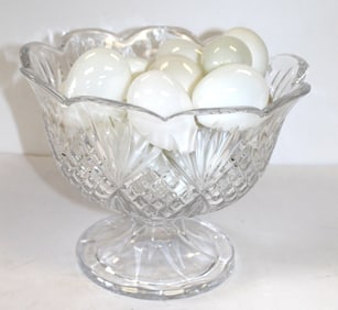 Large lot of glass eggs in cut glass bowl - eggs are 2 1/2"-3"