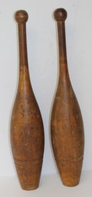 Pair of antique wooden Indian pins - 22"
