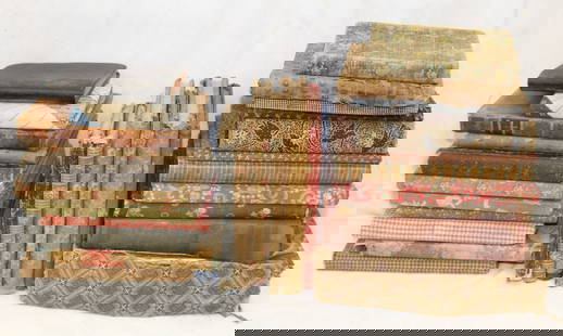 Large lot of fabric covered books for display: Large lot of fabric covered books for display
