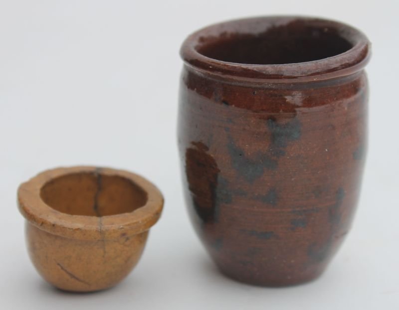 two 19thC PA redware vessels - one miniature 2" jar & a: two 19thC PA redware vessels - one miniature 2" jar & a miniscule 3/4" bowl - interesting glazes on both